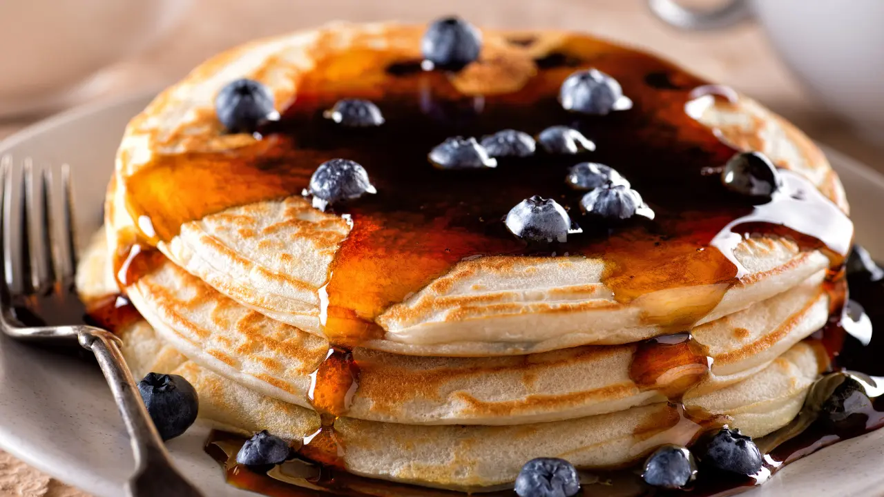 fresh corn pancakes with blueberry sauce